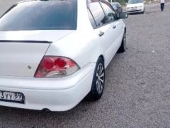 Фото авто Mitsubishi Lancer