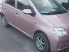 Photo of the vehicle Daihatsu Cuore