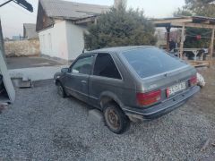 Сүрөт унаа Mazda 323