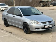 Фото авто Mitsubishi Lancer