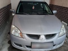 Фото авто Mitsubishi Lancer