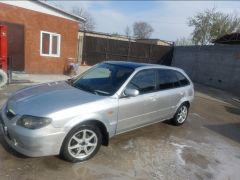 Фото авто Mazda 323