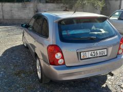 Photo of the vehicle Mazda 323