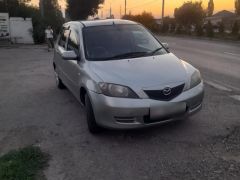 Фото авто Mazda Demio