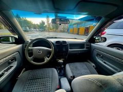 Сүрөт унаа Mazda Demio