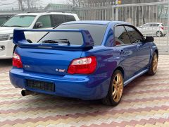 Фото авто Subaru Impreza WRX STi