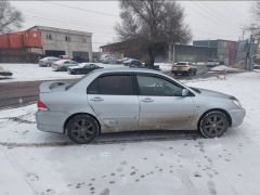 Photo of the vehicle Mitsubishi Lancer