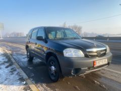 Photo of the vehicle Mazda Tribute