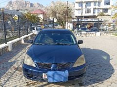 Фото авто Mitsubishi Lancer