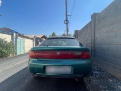 Photo of the vehicle Mazda 323