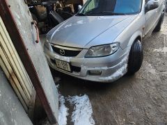 Photo of the vehicle Mazda 323