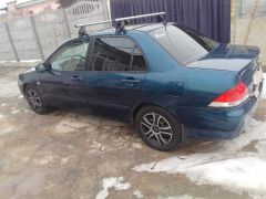 Фото авто Mitsubishi Lancer