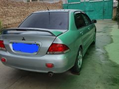 Фото авто Mitsubishi Lancer