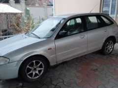 Фото авто Mazda 323