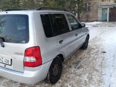 Photo of the vehicle Mazda Demio