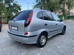 Фото авто Nissan Almera Tino