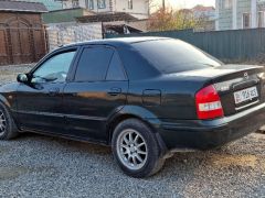 Photo of the vehicle Mazda 323