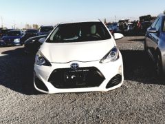 Фото авто Toyota Prius c