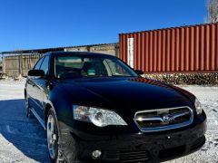 Photo of the vehicle Subaru Legacy