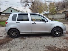 Photo of the vehicle Mazda Demio