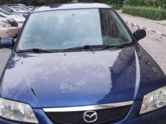 Сүрөт унаа Mazda 323