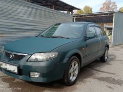 Фото авто Mazda 323