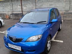 Photo of the vehicle Mazda Demio