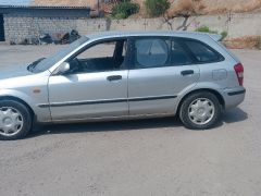 Фото авто Mazda 323