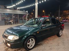 Сүрөт унаа Mazda 323