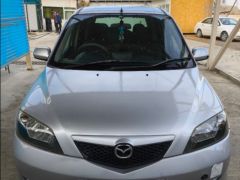 Фото авто Mazda Demio