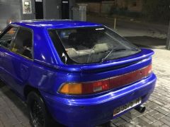 Фото авто Mazda 323