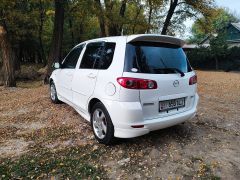 Photo of the vehicle Mazda Demio