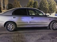 Фото авто Kia Shuma