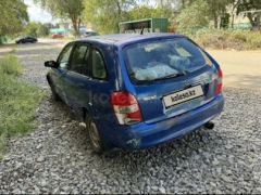 Сүрөт унаа Mazda 323