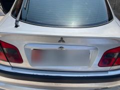 Сүрөт унаа Mitsubishi Carisma