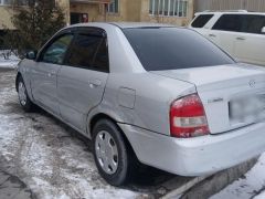 Фото авто Mazda Familia