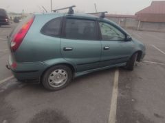 Photo of the vehicle Nissan Almera Tino