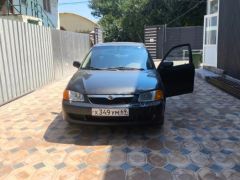 Сүрөт унаа Mazda Protege