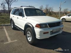 Сүрөт унаа Mitsubishi Montero Sport