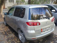 Photo of the vehicle Mazda Demio