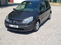 Photo of the vehicle Renault Scenic