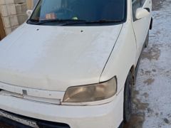 Сүрөт унаа Nissan Cube