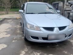 Фото авто Mitsubishi Lancer