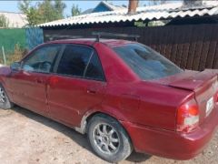 Сүрөт унаа Mazda 323