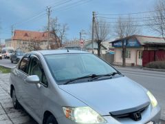 Photo of the vehicle Honda Fit Aria