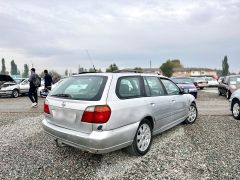 Фото авто Nissan Primera