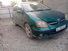 Фото авто Nissan Almera Tino