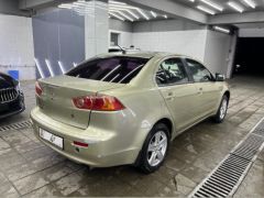 Фото авто Mitsubishi Lancer