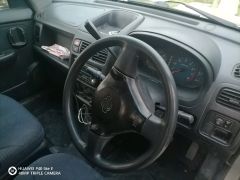 Сүрөт унаа Nissan Cube