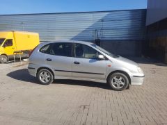 Photo of the vehicle Nissan Almera Tino